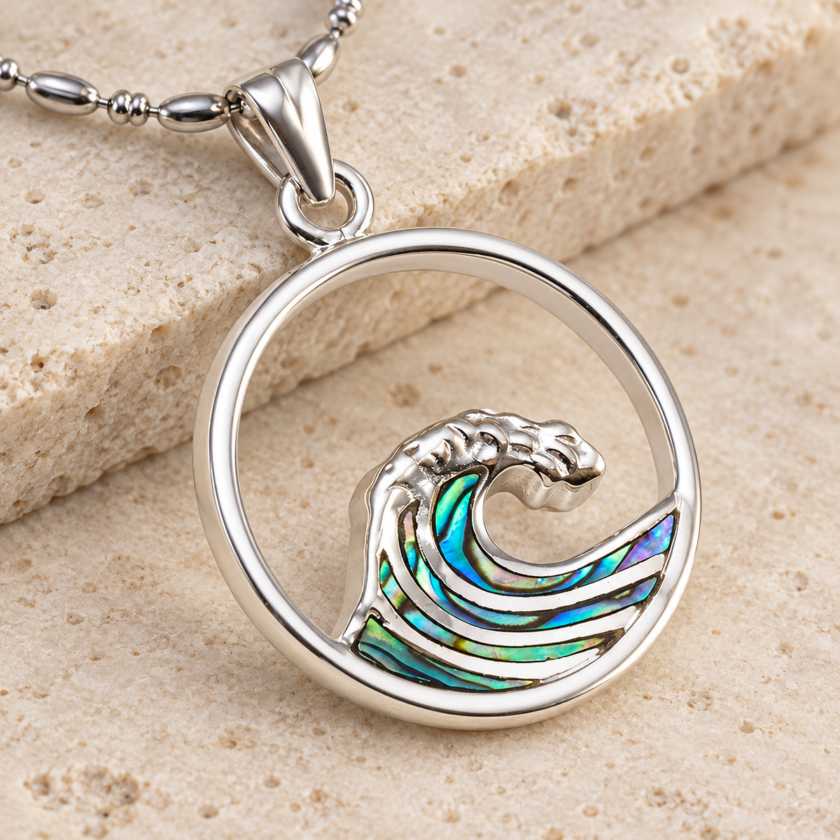 Sterling silver ocean wave pendant with abalone shell inlay, alternate angle