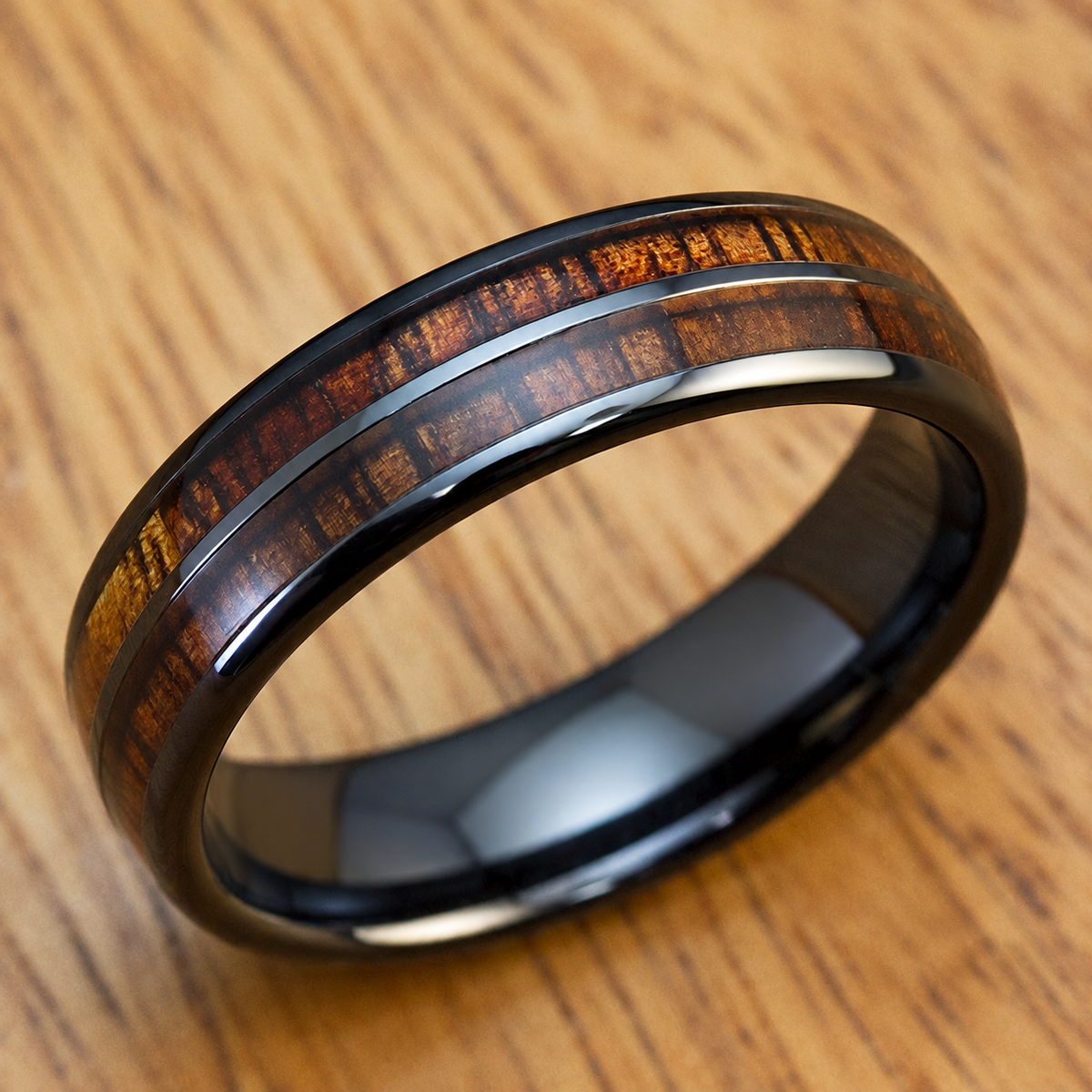 Black ceramic ring with Hawaiian koa wood duo inlay
