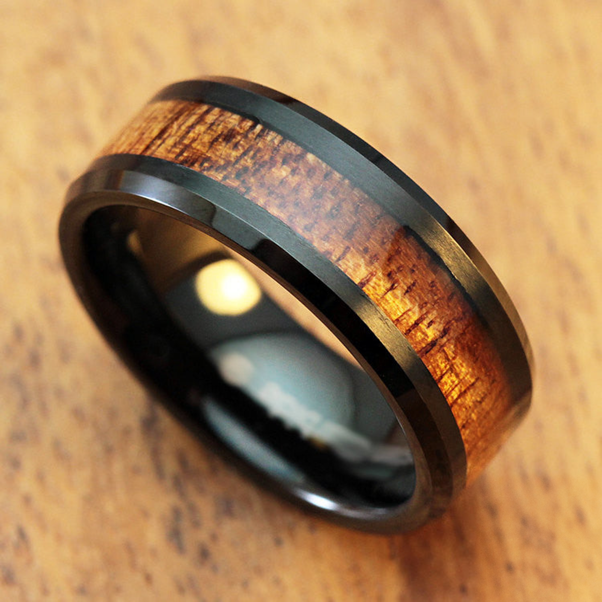 Black Tungsten Carbide Bevelled Edge Ring With Koa Wood Inlay Black Tungsten Carbide Bevelled Edge Ring With Koa Wood Inlay
