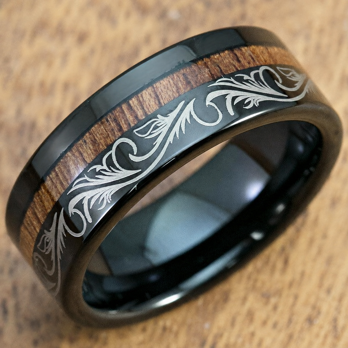 Black tungsten scroll pattern ring with offset Hawaiian koa wood inlay, clean product image