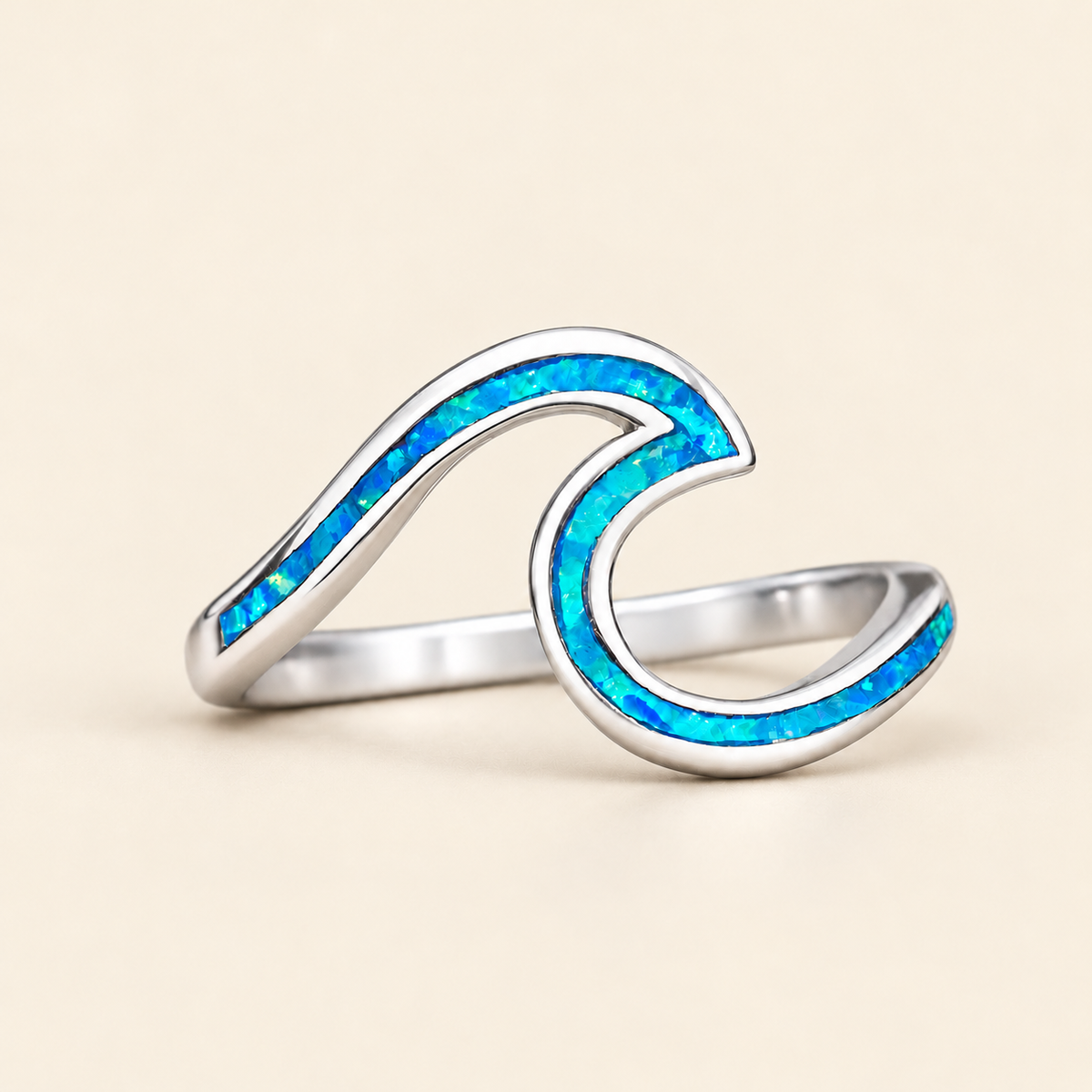 Petite sterling silver wave ring with blue and turquoise opal inlay on ivory