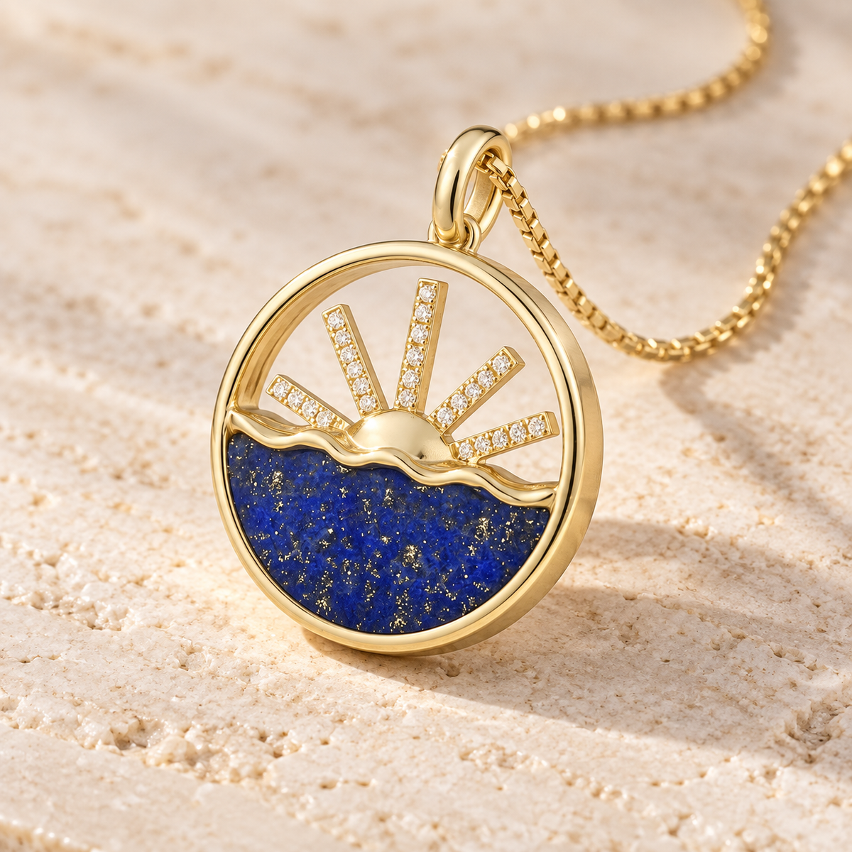 Angled view of 14K gold lapis and diamond sunrise pendant showing gold rim depth