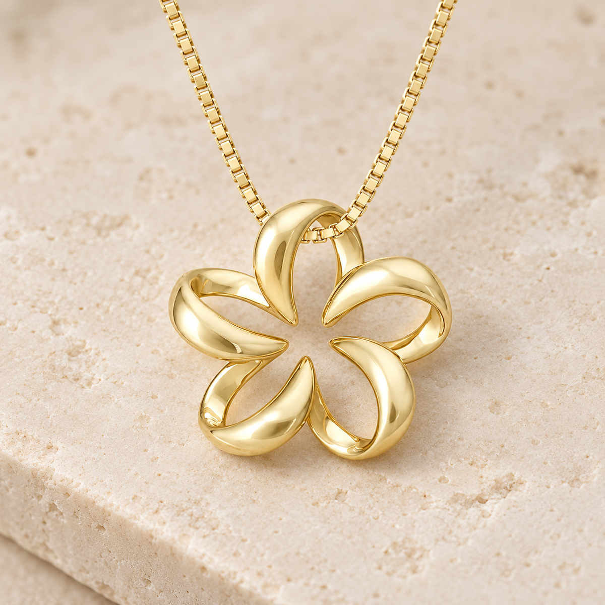 Plain 14K gold floating plumeria pendant with open center