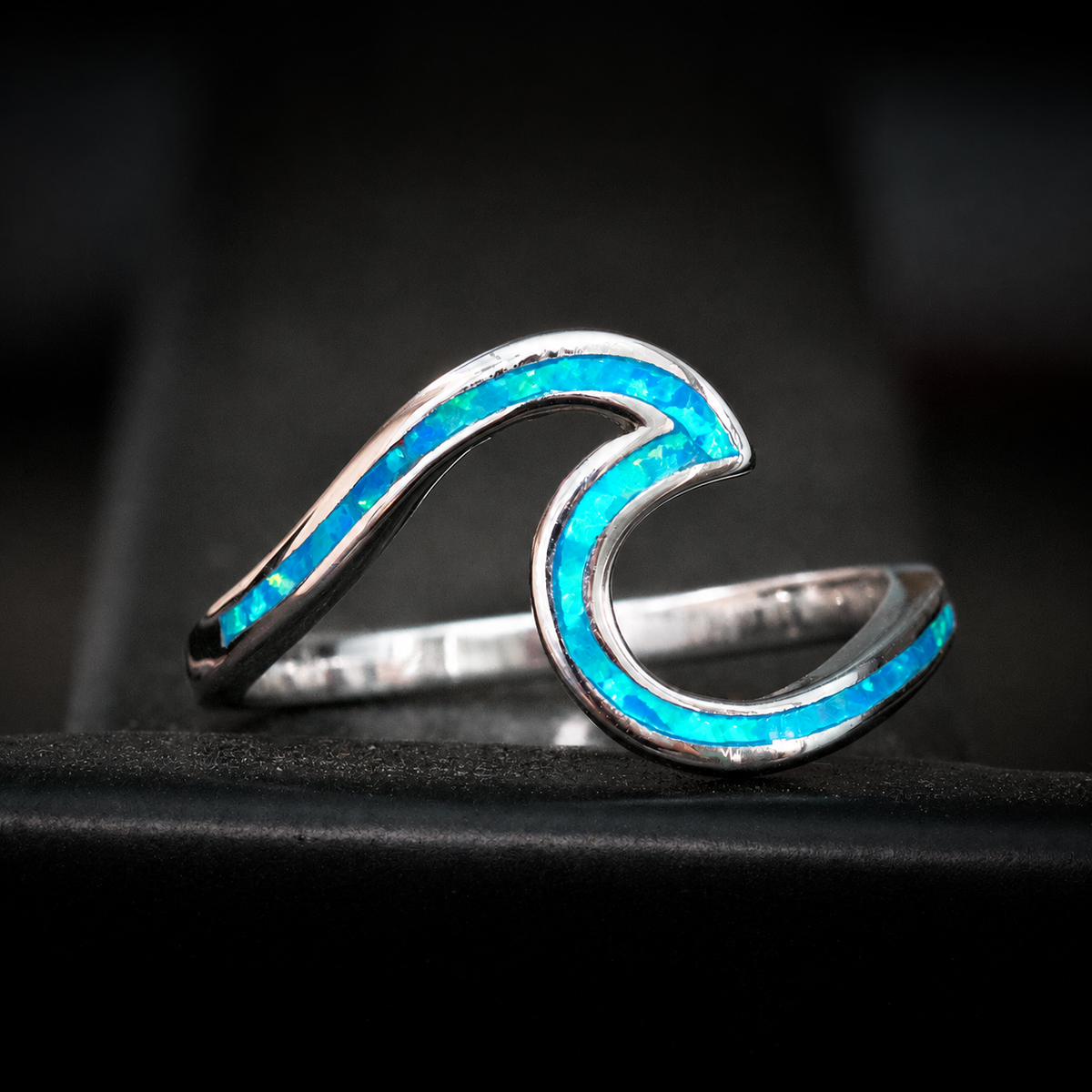 Petite sterling silver wave ring with blue opal inlay