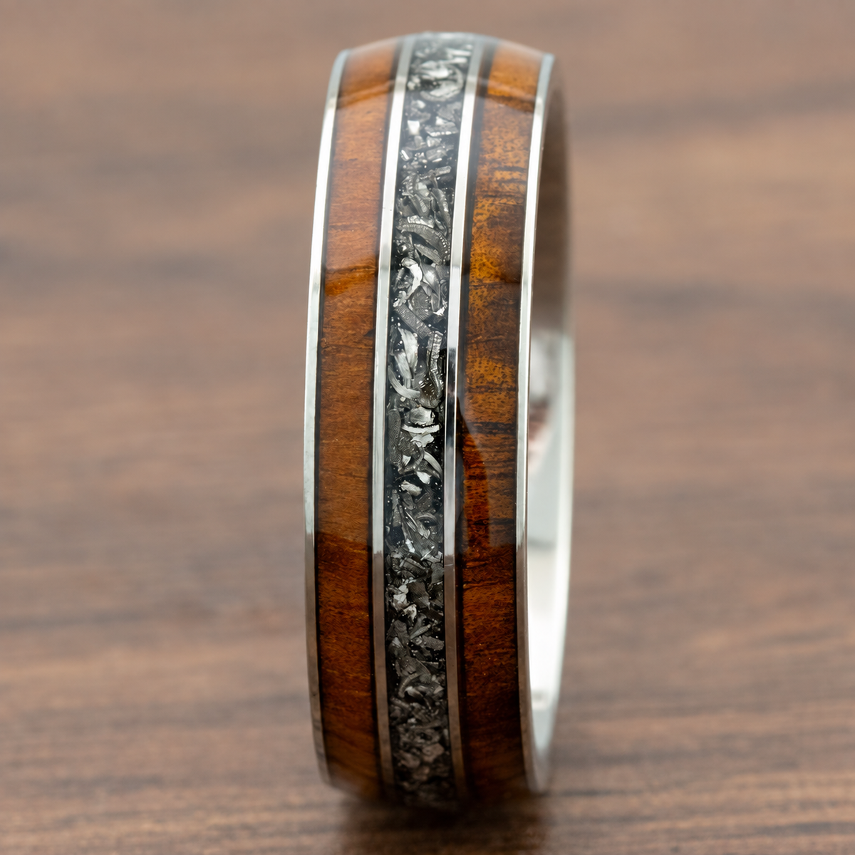 8mm titanium ring with Hawaiian koa wood and meteorite inlays, clean product image
