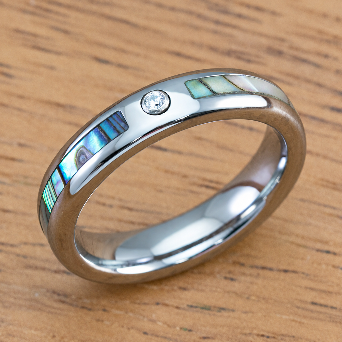 Tungsten carbide ring with abalone shell and cubic zirconia