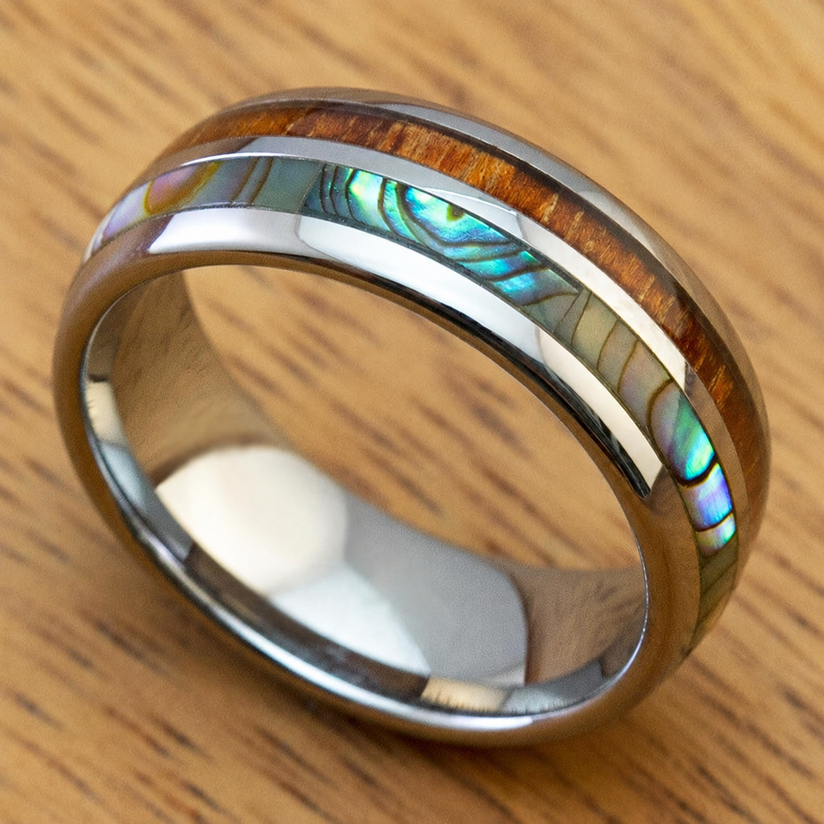 Tungsten carbide ring with Hawaiian koa wood and abalone shell inlay
