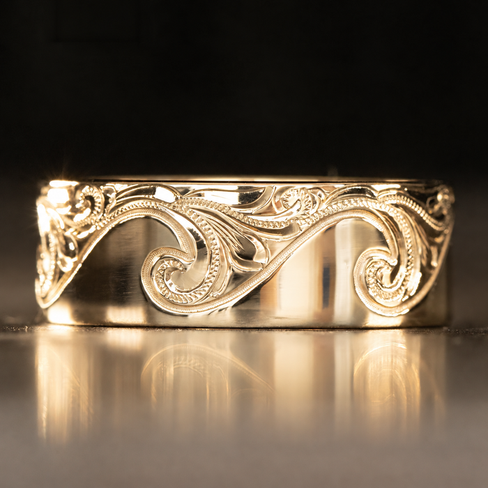 14K gold Catch the Wave 8mm ring hand engraved with a Hawaiian wave scroll design