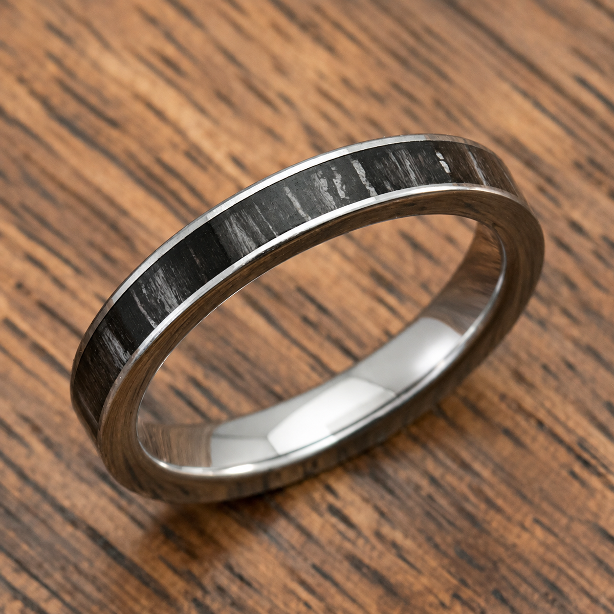 3mm tungsten carbide ring with ebony wood inlay, clean product image