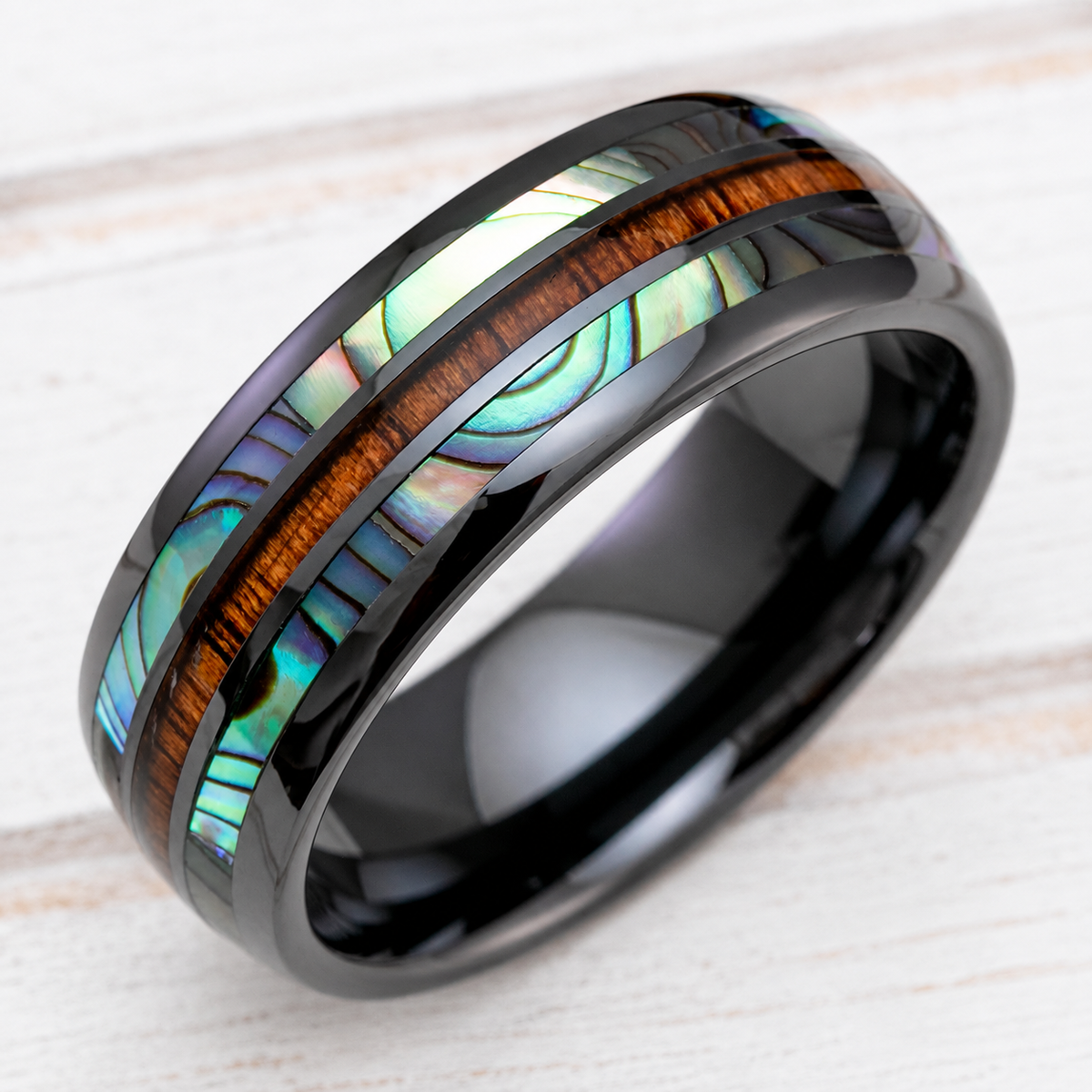 Black ceramic ring with abalone shell and koa wood tri-inlay