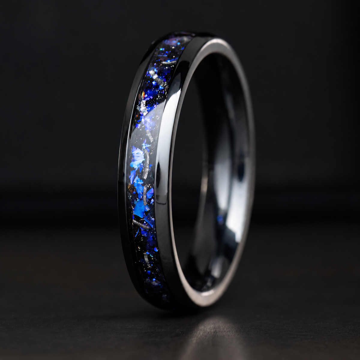 Black titanium ring with blue fire opal and meteorite