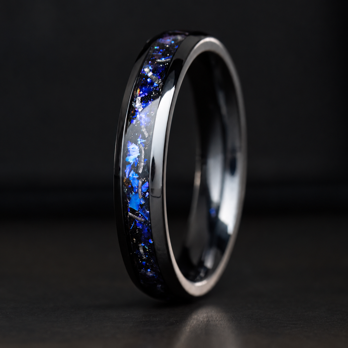 Black titanium ring with blue fire opal and meteorite