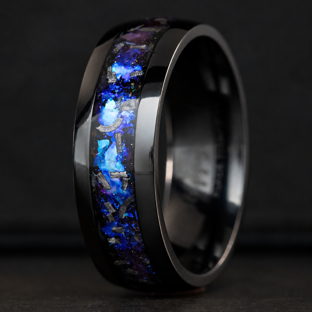 Black titanium ring with blue fire opal and meteorite inlay