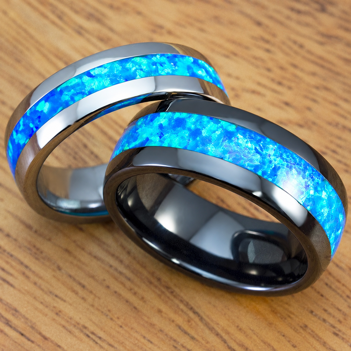 Black ceramic and tungsten wedding band set with blue opal inlay
