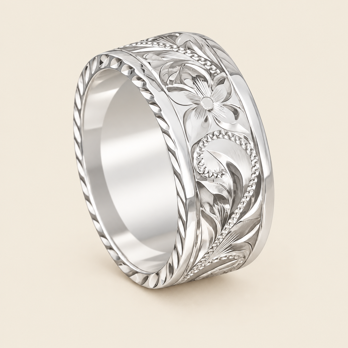 Sterling silver Hawaiian Old English engraved ring on ivory