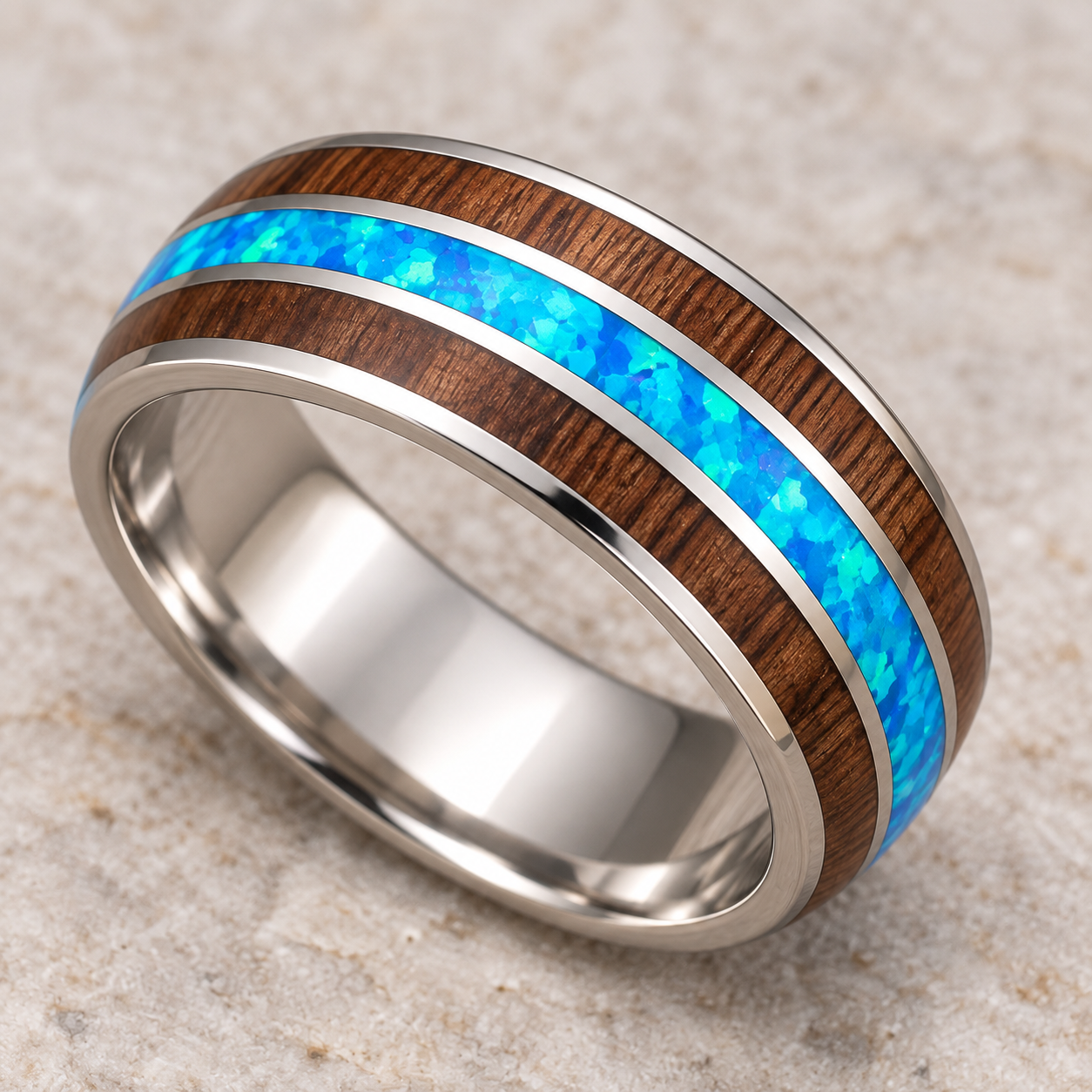 Koa wood and blue opal tri-inlay ring, lower angled view