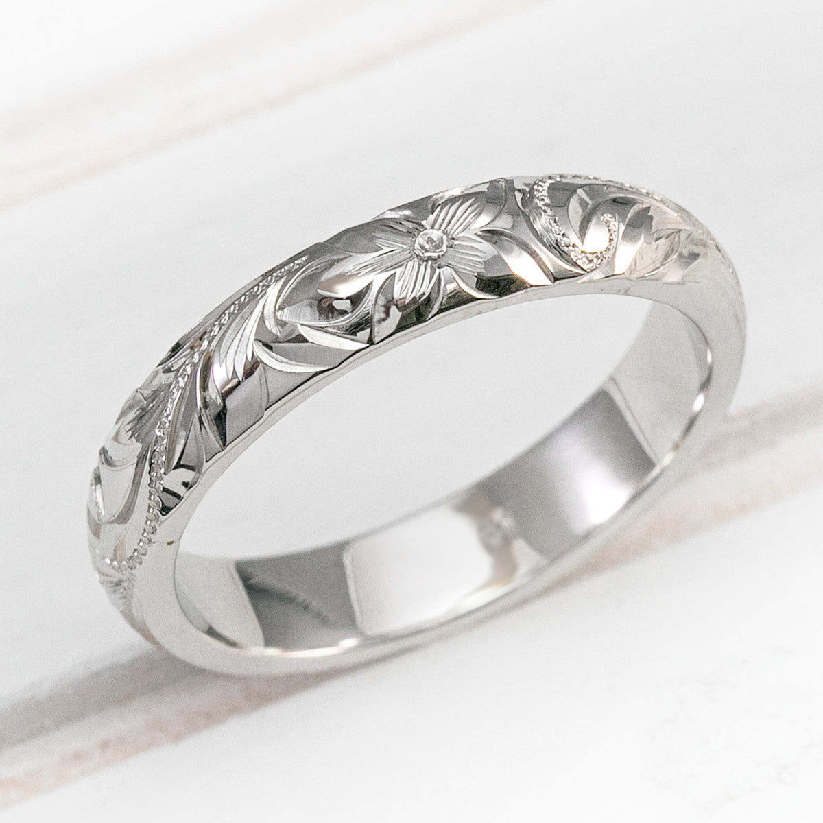 Solid white gold or platinum Hawaiian hand engraved 4mm ring with floral and scroll design