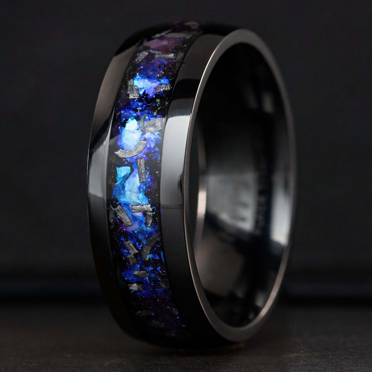 Black titanium ring with blue fire opal and meteorite inlay, alternate angled view
