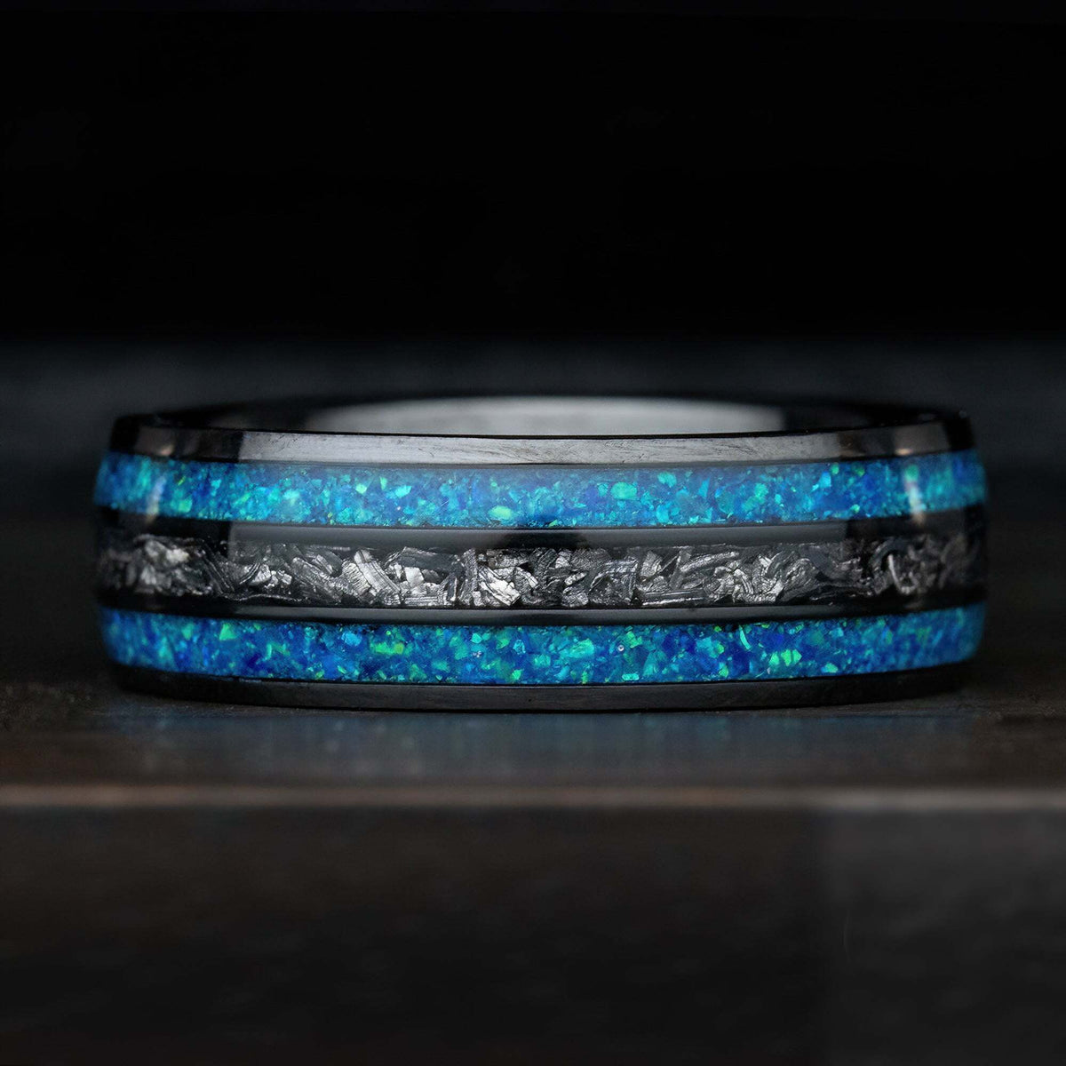 Black titanium ring with azure blue opal and meteorite inlay, side profile