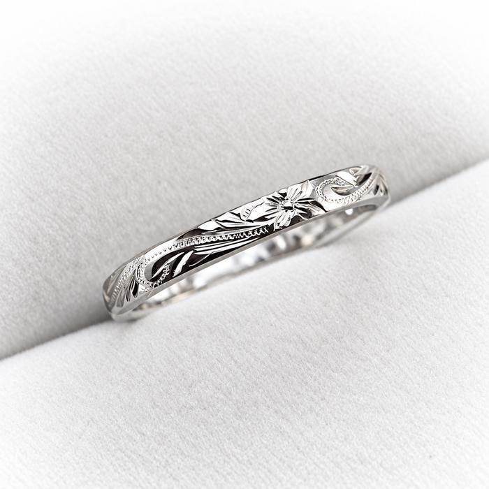 3mm platinum Hawaiian ring with hand engraved Old English plumeria and maile leaf design
