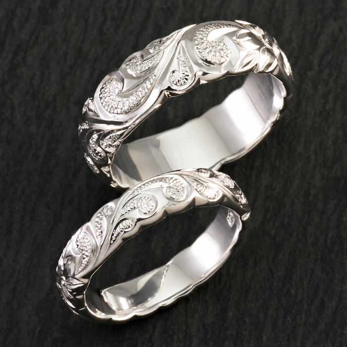 Pair of sterling silver Hawaiian scroll-engraved rings