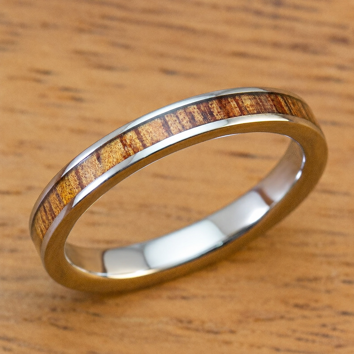Titanium ring with Hawaiian koa wood inlay