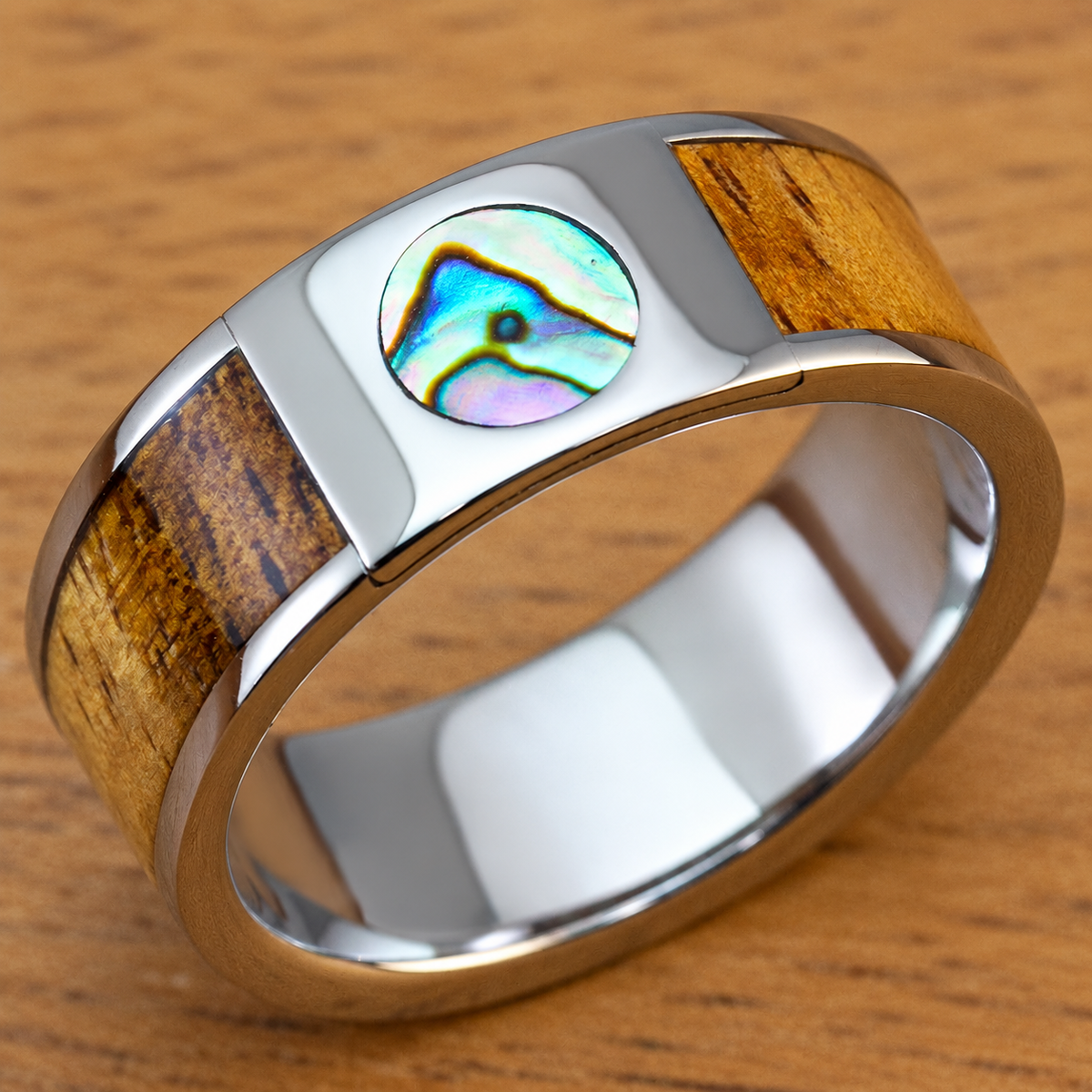 Titanium ring with abalone shell and Hawaiian koa wood