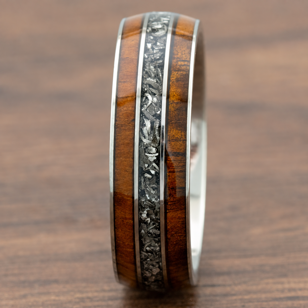 8mm titanium ring with Hawaiian koa wood and meteorite inlays, clean product image