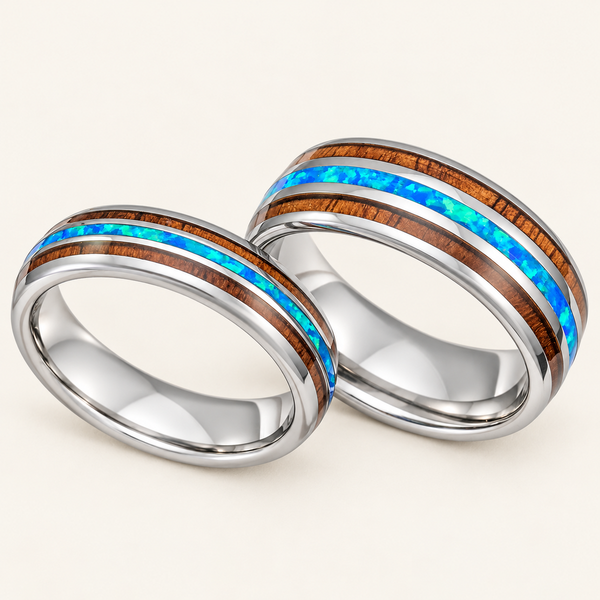 Tungsten 6mm and 8mm wedding ring set with blue opal between two Hawaiian koa wood inlays, polished pair on ivory