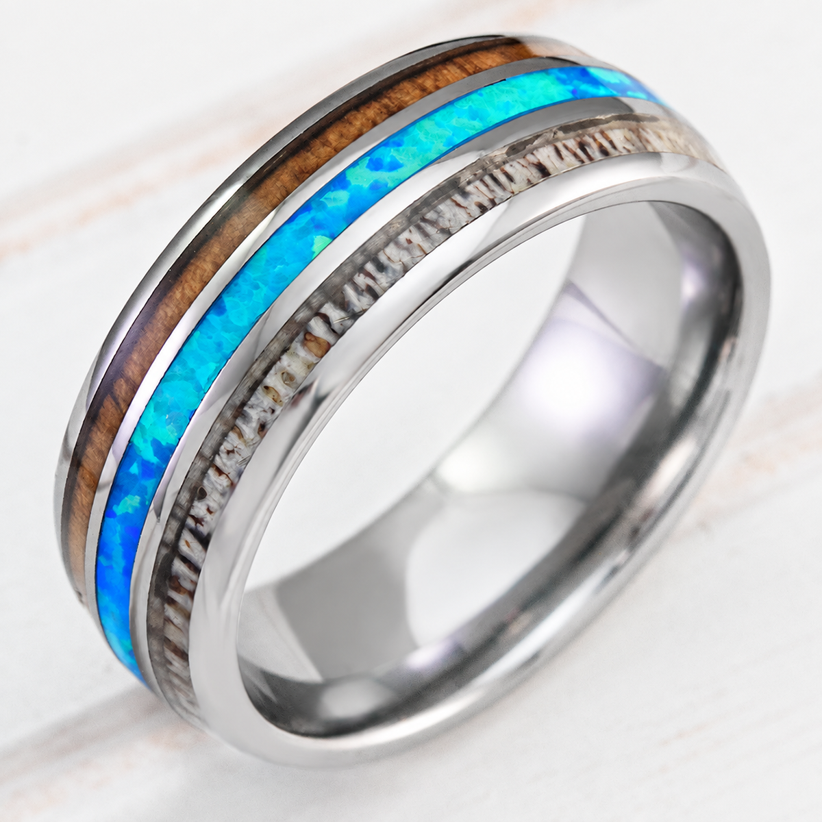 Tungsten ring with koa wood, blue opal and antler inlays