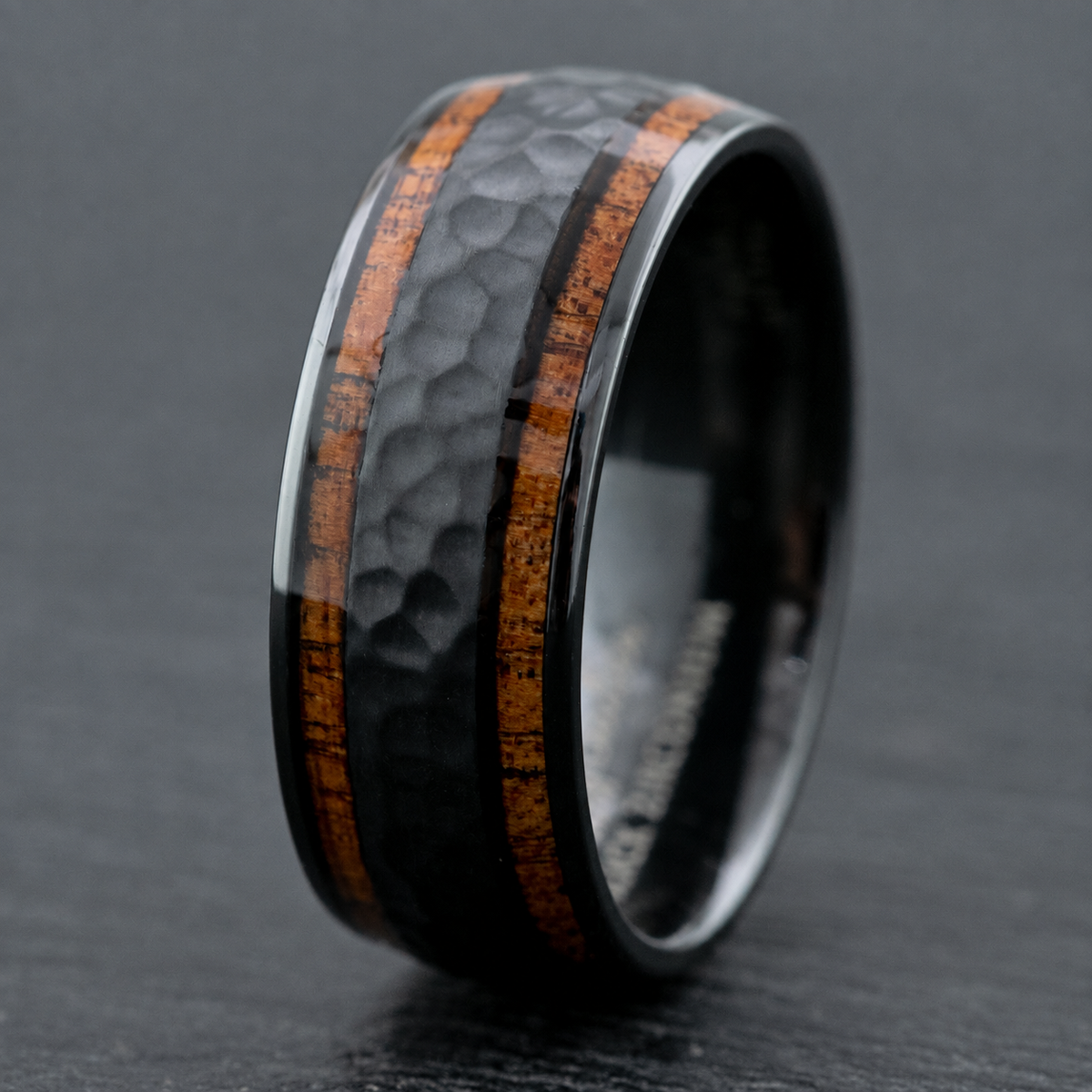 8mm black zirconium hammered ring with Hawaiian koa wood inlays, clean product image