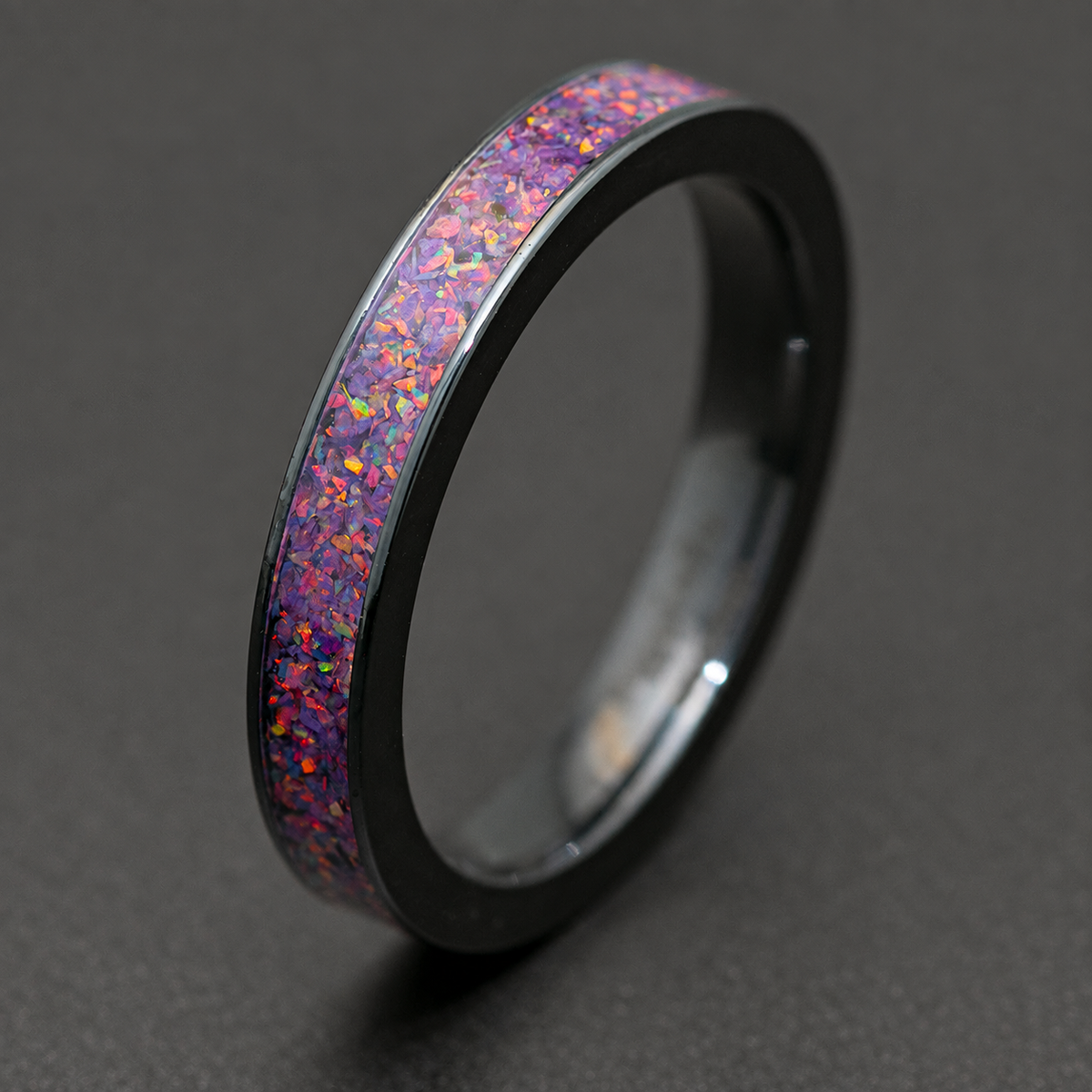 Black zirconium ring with lavender fire opal inlay