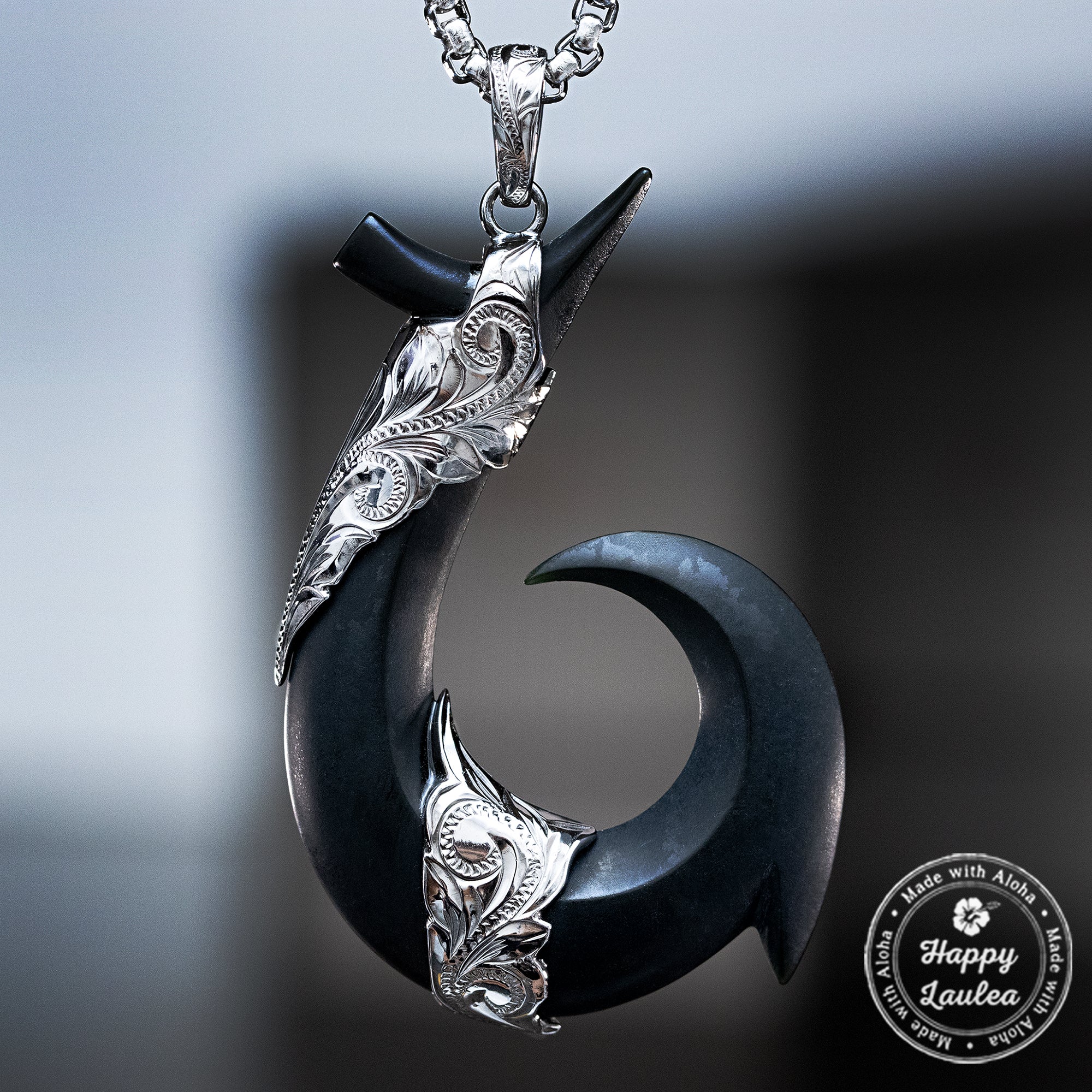black jade maori fish hook Necklace and said to bring the wearer strength New Zealand Greenstone Pounamu Hook